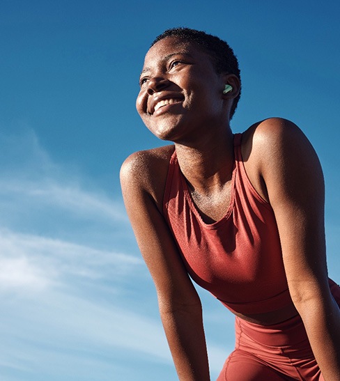 Lady smiles outdoors